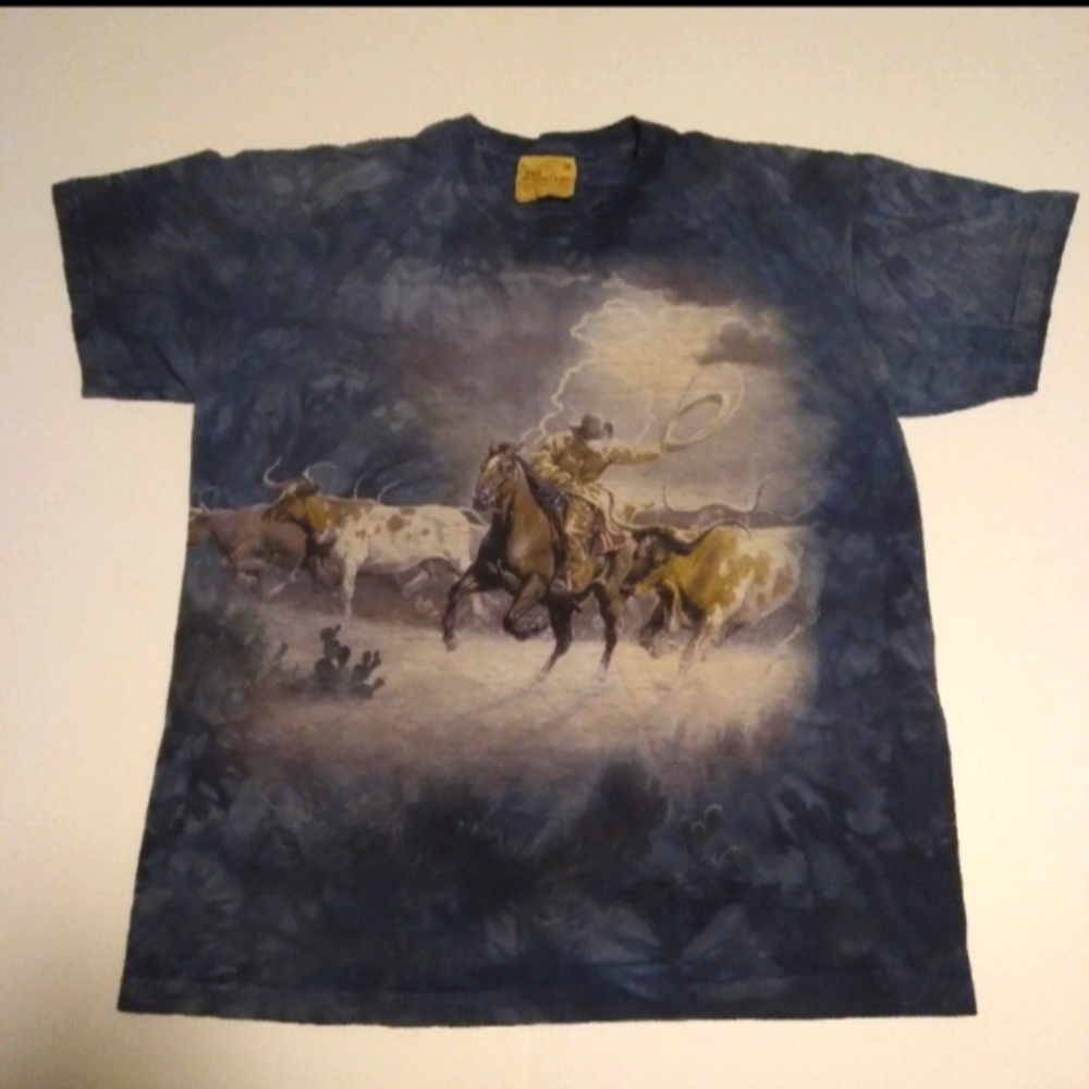 The Mountain Cowboy on Horse Lasoing Cows in a lightning Storm Shirt